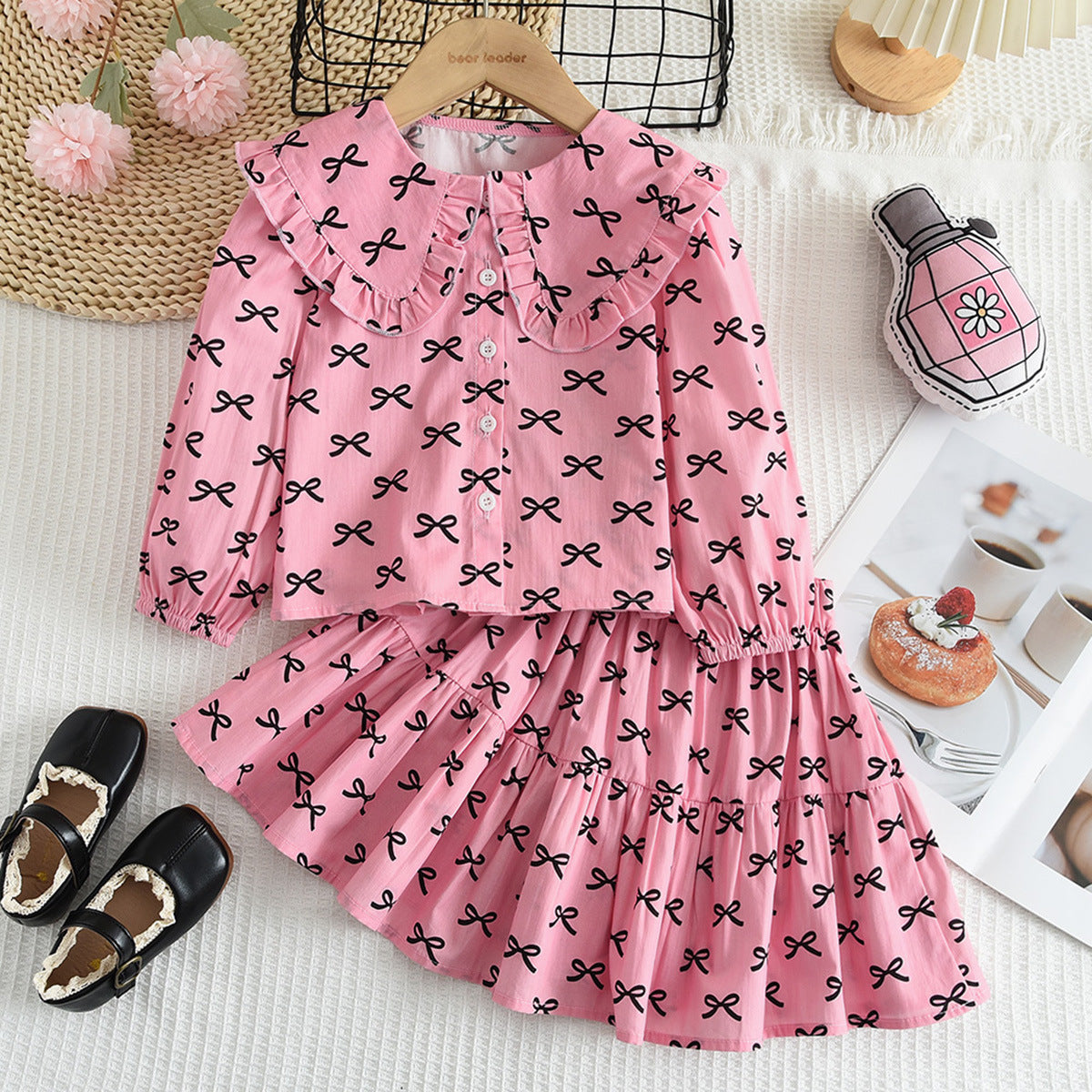Cross-Border Hot-Selling Korean-Style Children's Clothing New Bow Print Long-Sleeve Doll Shirt Short Skirt Girls' 2026 Spring and Autumn Set