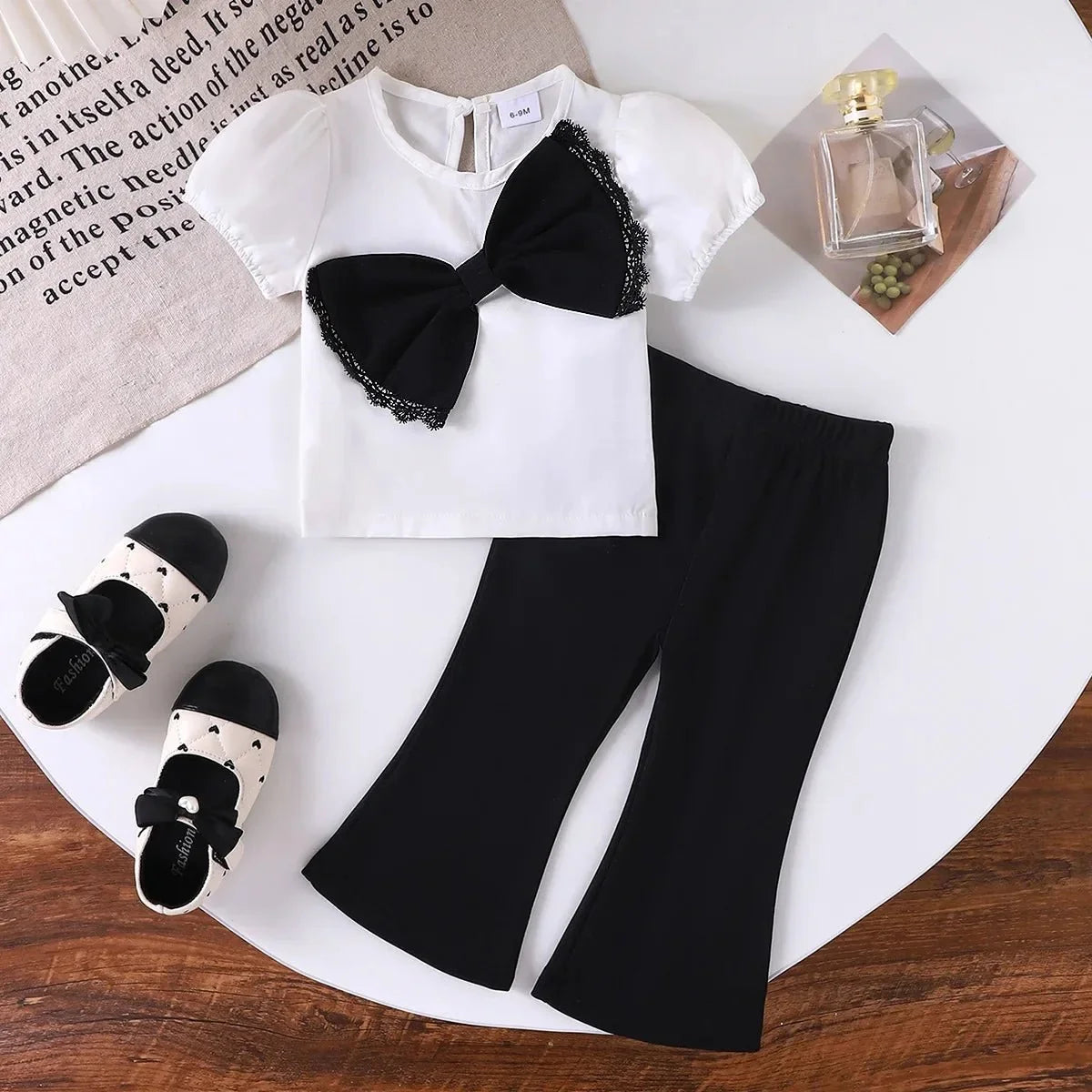 Europe  United States summer girl suit new temperament girl suit  child bubble sleeve short sleeve + micro pants two-piece set